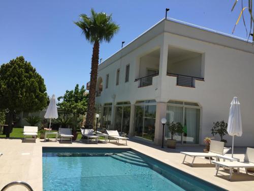 Фотография мини отеля BeB Marricriu con piscina