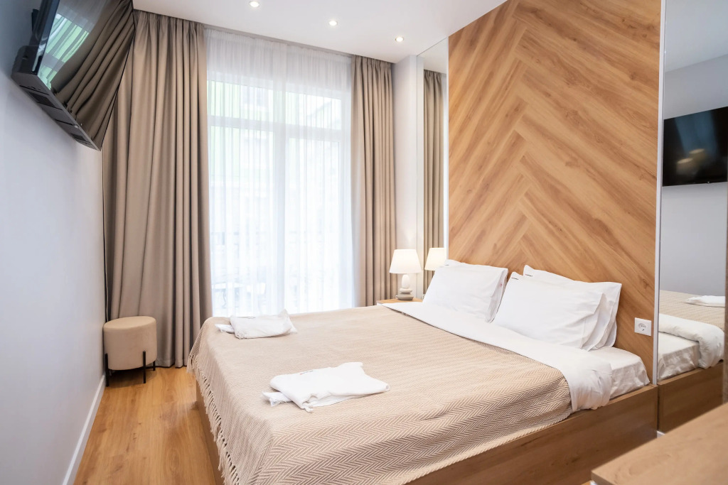 Фотография квартиры Апартаменты Red Apartments Арт Лайт Сити (Дефо)