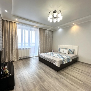 Фотография квартиры Апартаменты с видом на город создают уютную атмосферу