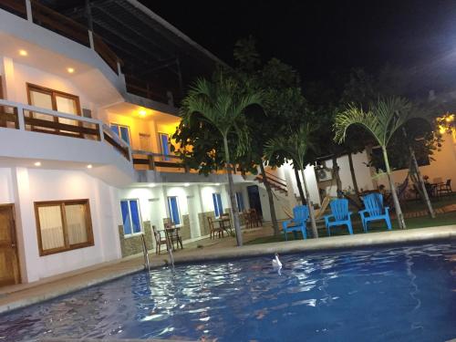 Фотографии гостевого дома 
            Hotel Loja Isabela