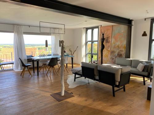 Фотография гостевого дома Atelier de Pfalz-Loftstyl mit Pfalzblick