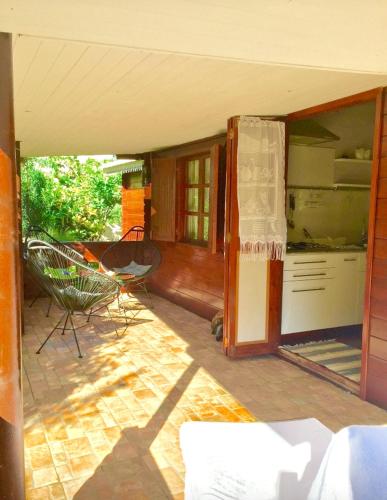 Фотография гостевого дома 2 bedrooms house at Albion 100 m away from the beach with shared pool enclosed garden and wifi