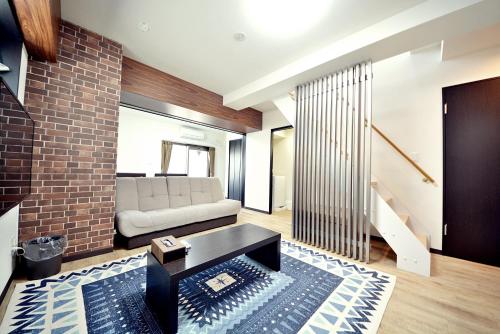 Фотография апарт отеля TAKUTO STAY SAKAISUJI-HOMMACHI