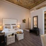 Фотография гостевого дома Arenula Suites