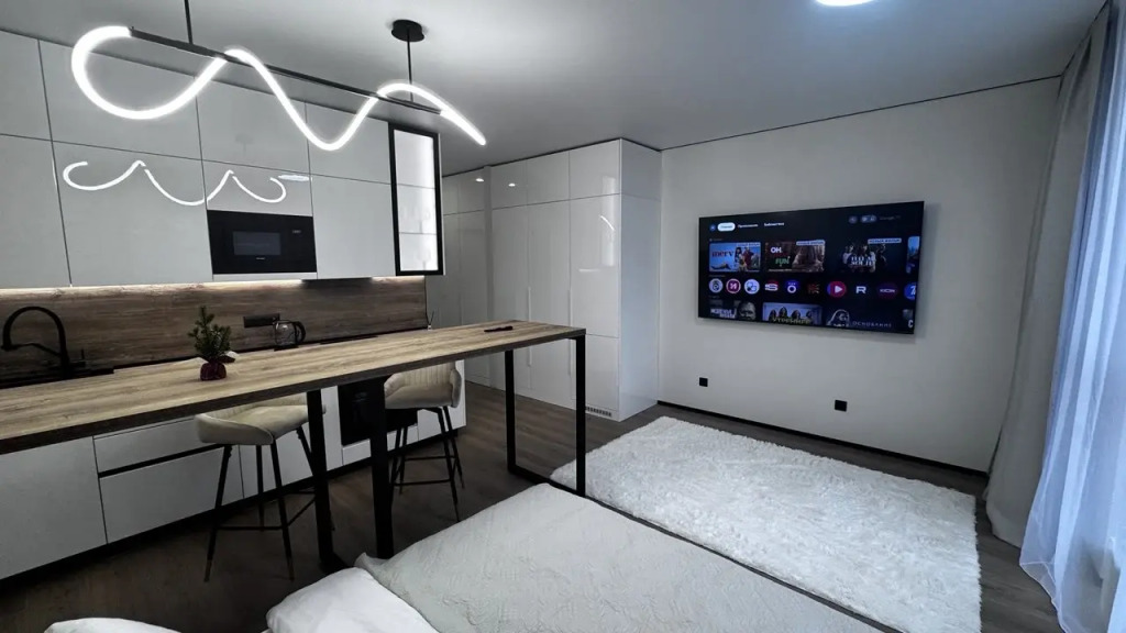 Фотография квартиры Апартаменты Ваш уголок спокойствия: светлая студия посуточно в спальном районе