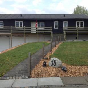 Фотографии гостевого дома 
            Ny istandsat træhus i Givskud