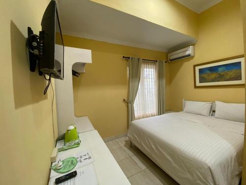 Фотография гостиницы Omah Inap D24 Syariah Nogotirto RedPartner