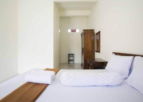 Фотография гостиницы KoolKost Syariah at Ir Soekarno Solo Baru