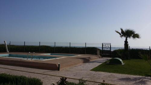 Фотография гостевого дома Beach Front Luxury Living Apartment