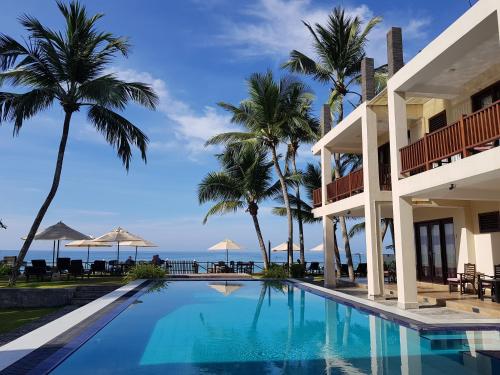 Фотография гостиницы Sapphire Seas Beachfront Hotel