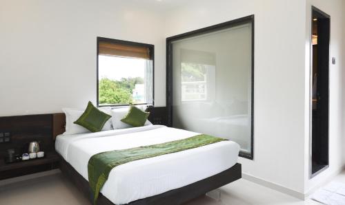 Фотография гостиницы Treebo Trend Malhaar Regency