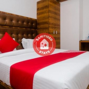 Фотография гостиницы Capital O 30550 Riva International