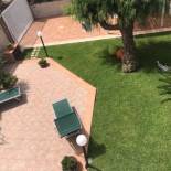 Фотография гостевого дома Villa Mary con GIARDINO a due passi dal MARE SANIFICATA