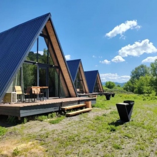 Фотография Коттеджа Шале двухэтажный А-фрейм с панорамным остеклением и террасой