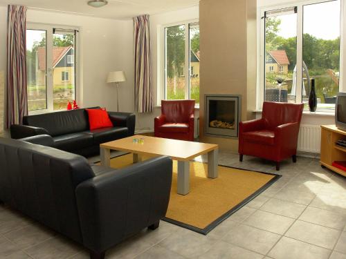 Фотография гостевого дома Holiday home Vakantiepark Het Timmerholt 10