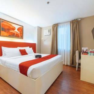 Фотографии гостиницы 
            RedDoorz Plus near Gaisano Mall Kalibo - Vaccinated Staff