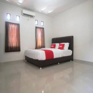 Фотографии гостиницы 
            OYO 1547 Wisma Ray Syariah