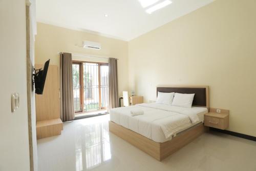 Фотография гостевого дома IDR Green Guest House Syariah RedPartner