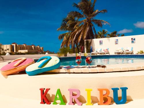 Фотография гостиницы Karibu Aruba Boutique Hotel
