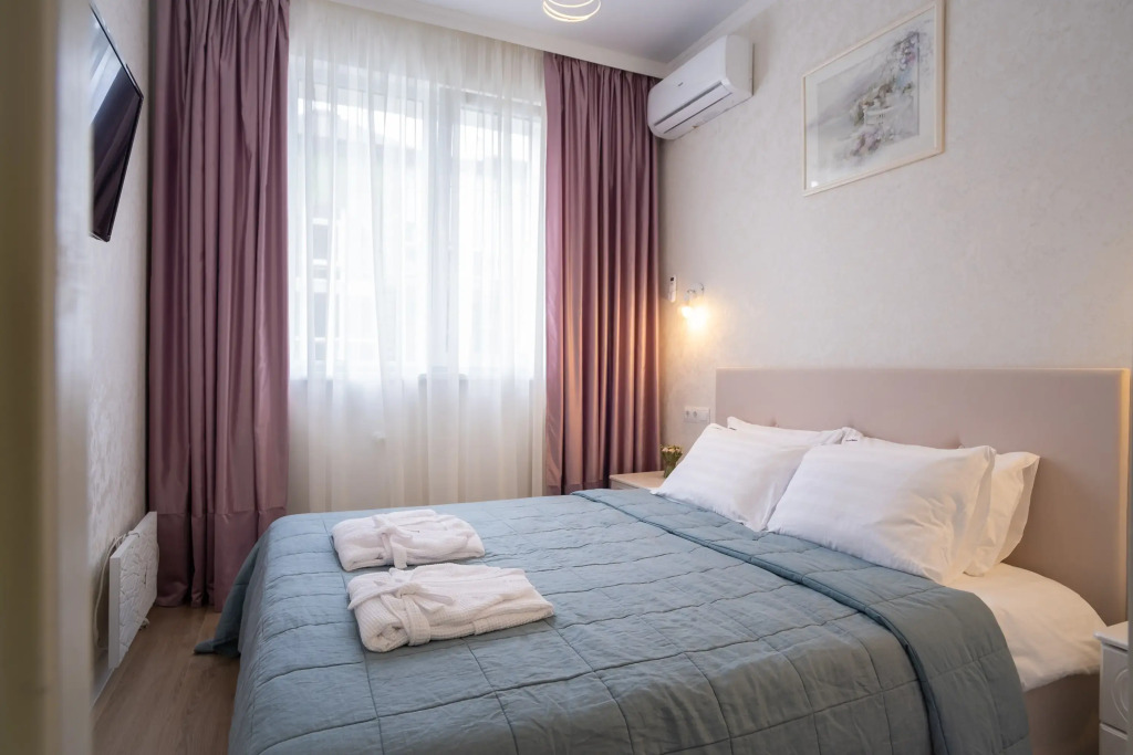 Фотография квартиры Апартаменты Red Apartments Арт Лайт Сити Ремарк