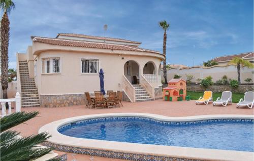 Фотографии гостевого дома 
            Stunning home in Rojales w/ Outdoor swimming pool, WiFi and 4 Bedrooms