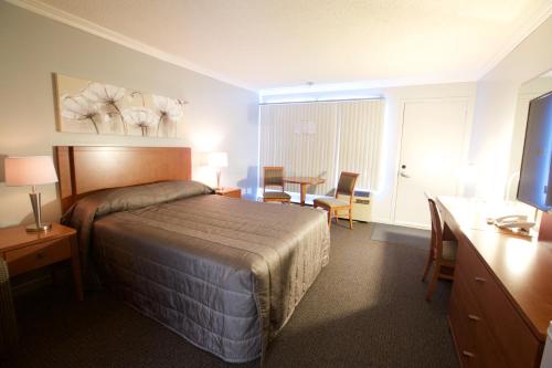 Фотография мотеля Motel Le Voyageur