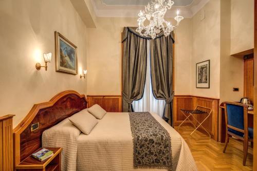 Фотография гостевого дома Relais Conte Di Cavour De Luxe