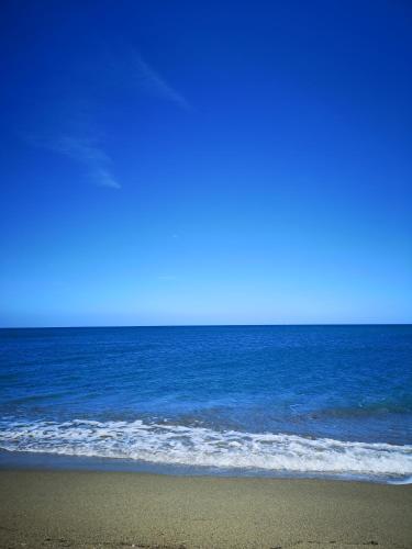 Фотография гостевого дома Face à la mer avec clim, wifi, parking, baignoire