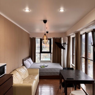 Фотография квартиры Апартаменты Просторная студия в центре Домбая