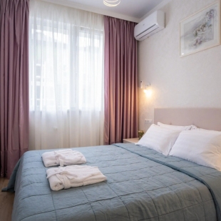 Фотография квартиры Апартаменты Red Apartments Арт Лайт Сити Ремарк