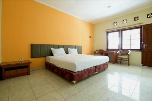 Фотография гостиницы OYO 3335 Wisma Langen Werdhasih