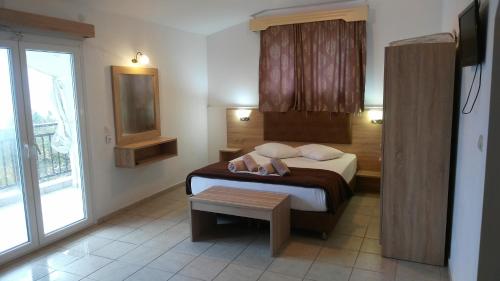 Фотография гостиницы Psarou apartments