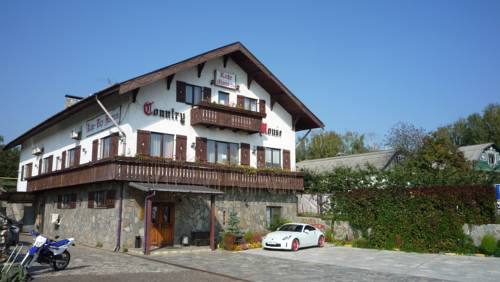 Фотография гостевого дома Кантри Хауз