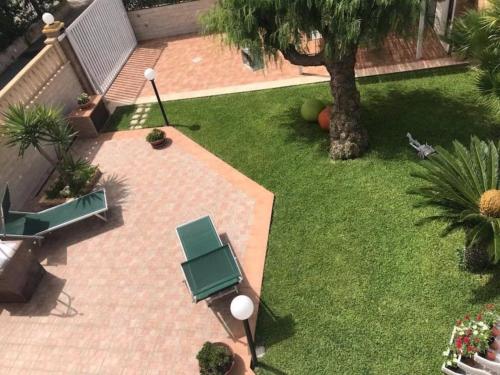 Фотография гостевого дома Villa Mary con GIARDINO a due passi dal MARE SANIFICATA