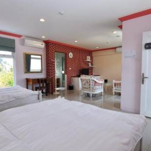 Фотографии гостевого дома 
            Xinghai Seaview Guesthouse