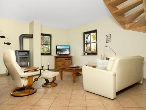 Фотографии гостевого дома 
            Reetdachhaus Hus Kieker