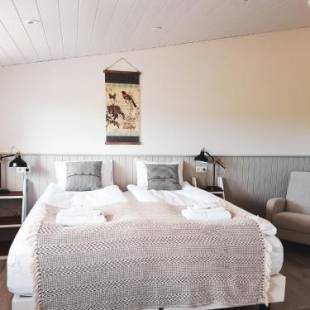 Фотографии гостевого дома 
            Grásteinn Guesthouse