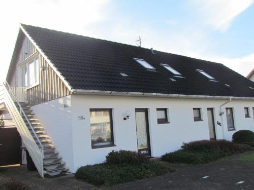 Фотографии гостевого дома 
            Gleich hinterm Deich 4