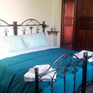 Фотографии гостевого дома 
            Affittacamere Carpe Diem