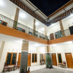 Фотографии гостиницы 
            OYO 1885 Wisma Wongso Syariah