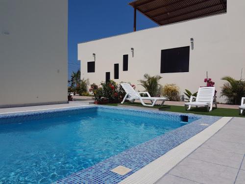 Фотография гостевого дома Matices del Mar en Canoas