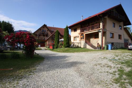 Фотография гостевого дома Pensiunea Dealul Frumos