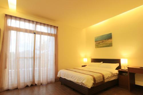 Фотография мини отеля Buda Banai Hostel 池上曬穀場旅棧