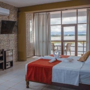 Фотография гостиницы El Cauchero Hotel