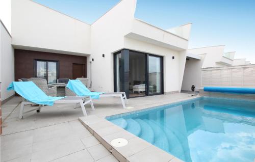 Фотографии гостевого дома 
            Awesome home in Los Alcázares w/ Outdoor swimming pool, Outdoor swimming pool and 3 Bedrooms