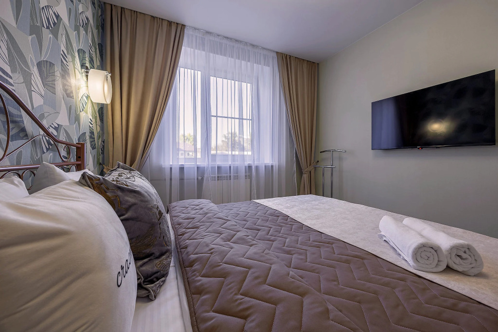 Фотография квартиры Апартаменты Улучшенные в Центре Города 1-комнатные