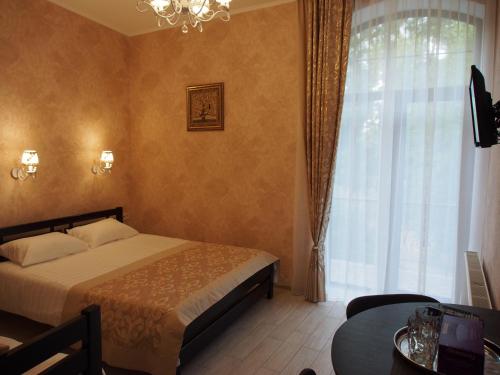 Фотографии гостевого дома 
            Kolmark Residence