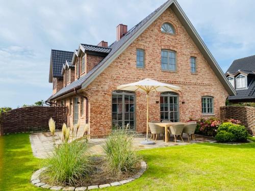 Фотографии гостевого дома 
            Ferienhaus SylterLiebe