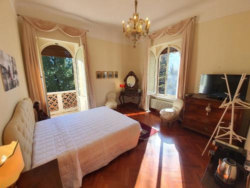 Фотографии гостевого дома 
            villa dei Merli - liberty suite & natural garden -