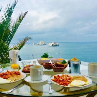 Фотографии мини отеля
Hill House Mazatlan